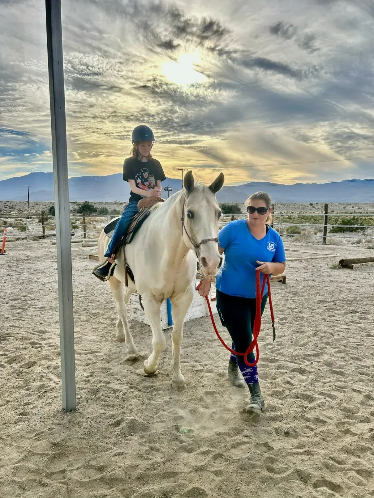 Volunteer with a horse at Coachella Valley Horse Rescue